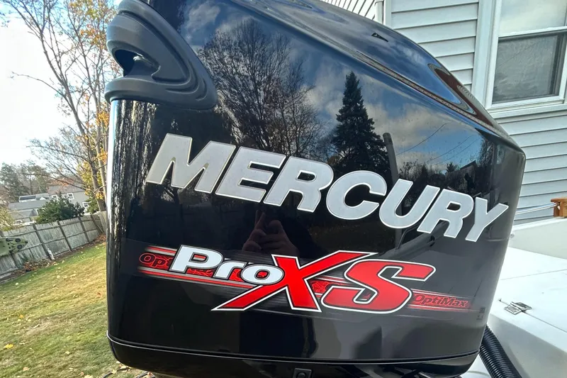 Slide: The Image of Mercury ProXS outboard motor on 2018 Mako 19 CPX boat. - 23