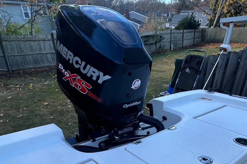 Slide: The Image of 2018 Mako 19 CPX boat with Mercury Pro XS outboard motor. - 24