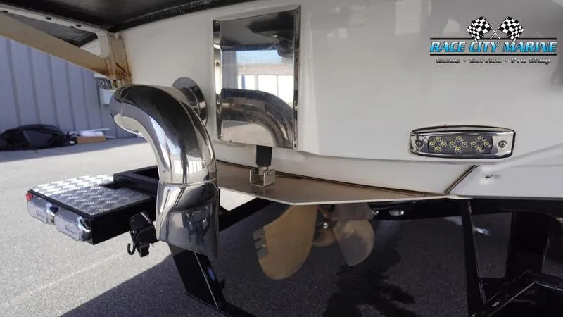 Slide: The Image of 2017 Nautique Super Air Nautique G23 boat propeller and stern details. - 10