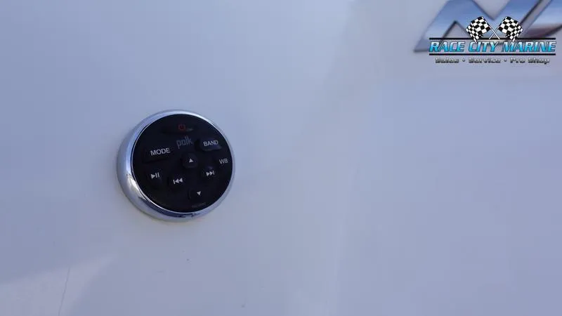 Slide: The Image of Close-up of 2017 Nautique Super Air Nautique G23 audio control panel. - 13