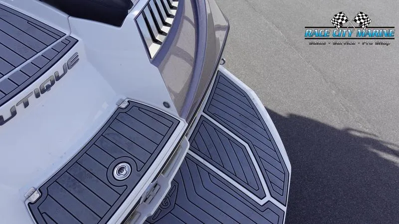 Slide: The Image of 2017 Nautique Super Air Nautique G23 boat deck with Race City Marine logo. - 14