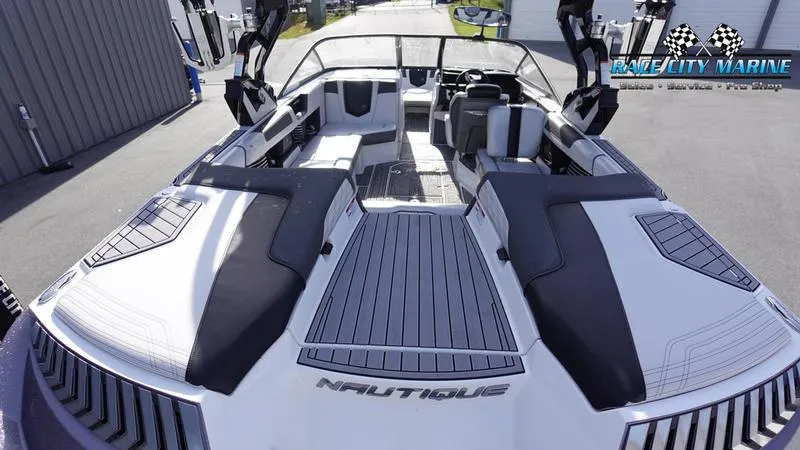 Slide: The Image of 2017 Nautique Super Air Nautique G23 interior, featuring sleek seating and modern design. - 16