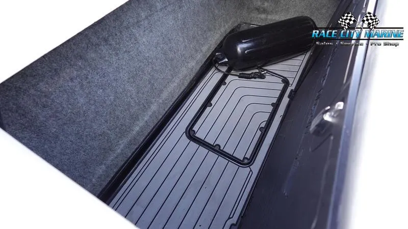 Slide: The Image of 2017 Nautique Super Air Nautique G23 storage compartment with Race City Marine branding. - 21