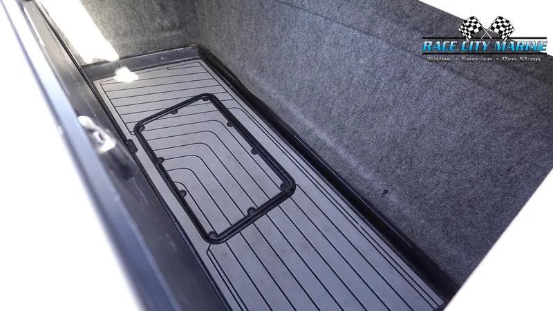 Slide: The Image of 2017 Nautique Super Air Nautique G23 storage compartment, Race City Marine logo visible. - 22