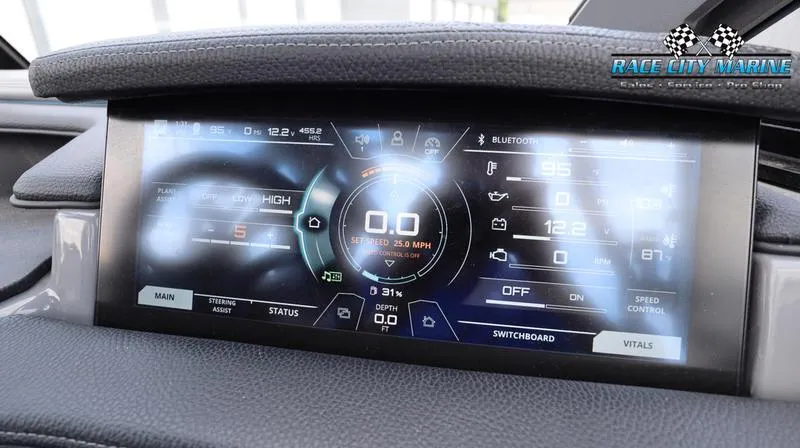 Slide: The Image of 2017 Nautique Super Air Nautique G23 dashboard display with digital controls and speedometer. - 39