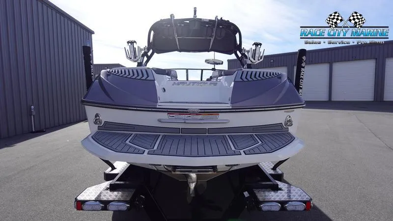 Slide: The Image of 2017 Nautique Super Air Nautique G23 boat on trailer at Race City Marine. - 4