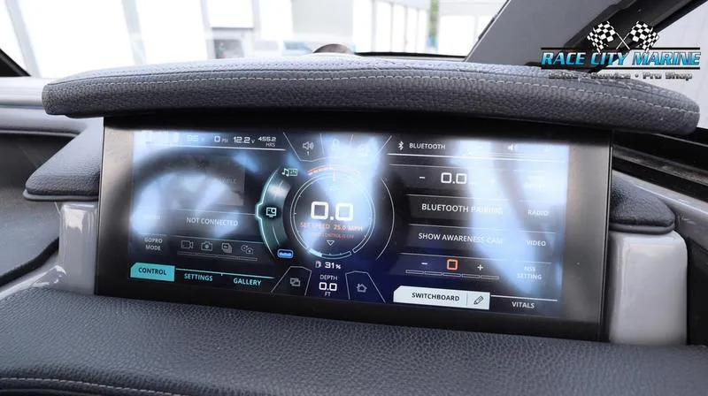 Slide: The Image of 2017 Nautique Super Air Nautique G23 dashboard display with control settings and Bluetooth connectivity. - 42