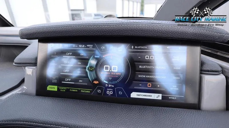 Slide: The Image of Dashboard display of 2017 Nautique Super Air Nautique G23 boat with digital controls. - 44