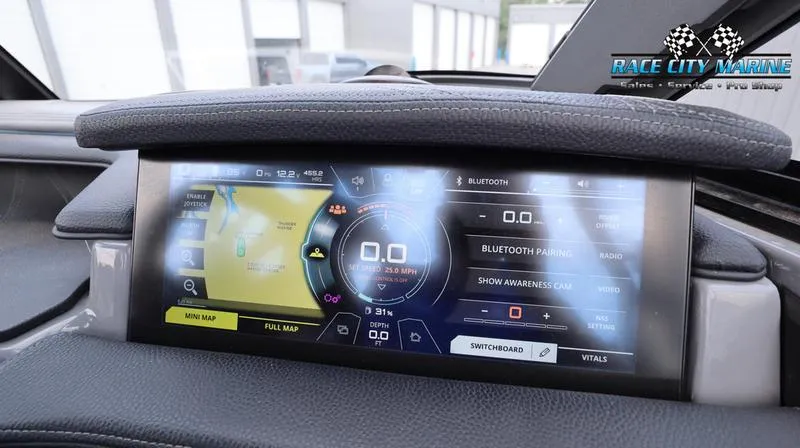 Slide: The Image of Dashboard display of 2017 Nautique Super Air Nautique G23 boat with navigation and controls. - 46