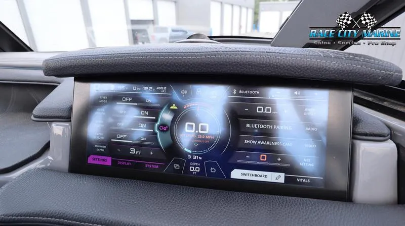 Slide: The Image of Touchscreen display of 2017 Nautique Super Air Nautique G23 boat dashboard. - 47