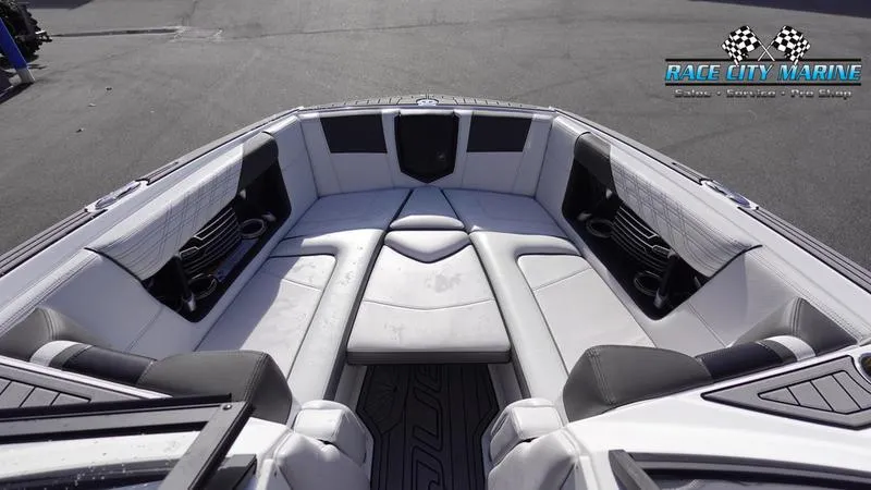 Slide: The Image of 2017 Nautique Super Air Nautique G23 boat interior with spacious seating and modern design. - 49