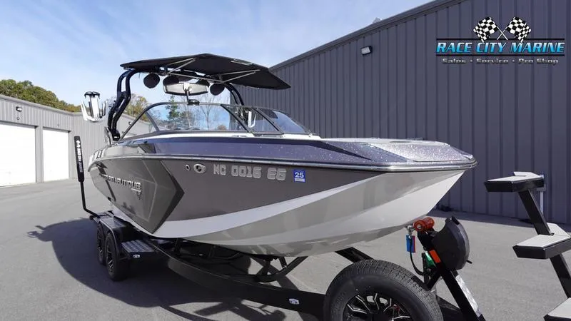 Slide: The Image of 2017 Nautique Super Air Nautique G23 boat at Race City Marine dealership. - 5