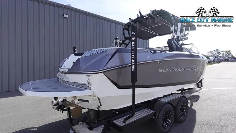 Slide: The Image of 2017 Nautique Super Air Nautique G23 boat on trailer at Race City Marine. - 8