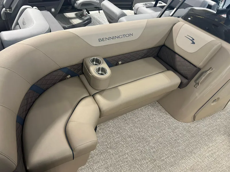 Slide: The Image of Luxurious seating in 2025 Bennington 22 SXSB pontoon boat with cup holders. - 6
