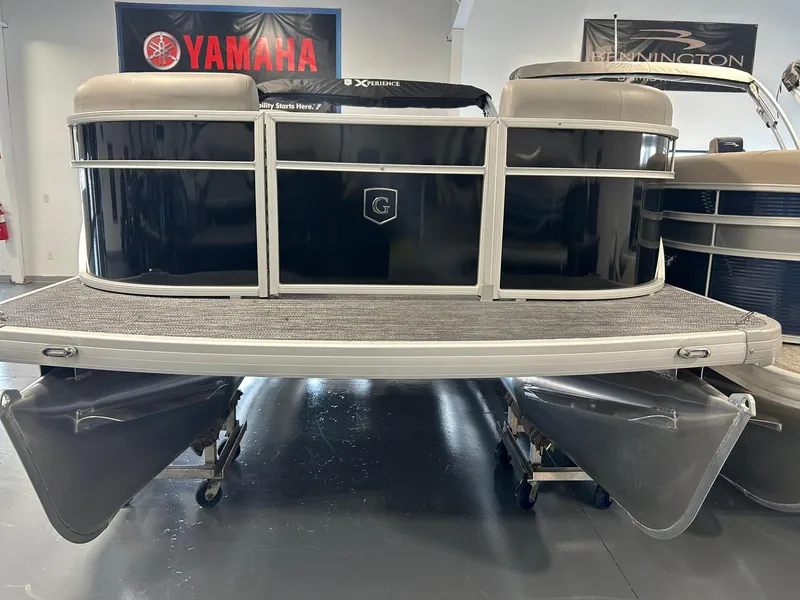 Slide: The Image of 2025 Godfrey Xperience 2086 SBX pontoon boat in showroom, featuring Yamaha and Bennington banners. - 14