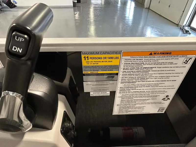 Slide: The Image of Control panel of 2025 Godfrey Xperience 2086 SBX with capacity and warning labels. - 7