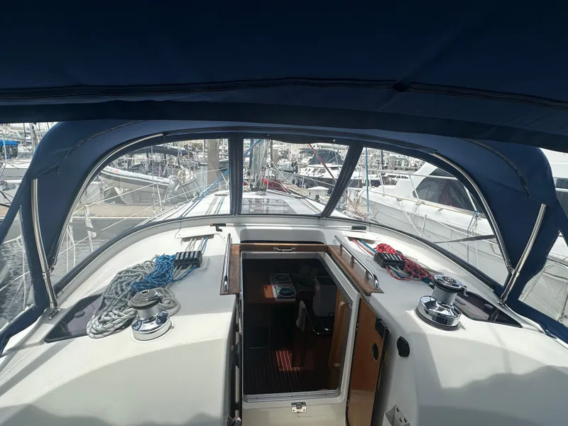 Slide: The Image of Cockpit view of 2011 Bavaria 36 Cruiser sailboat with ropes and winches. - 28