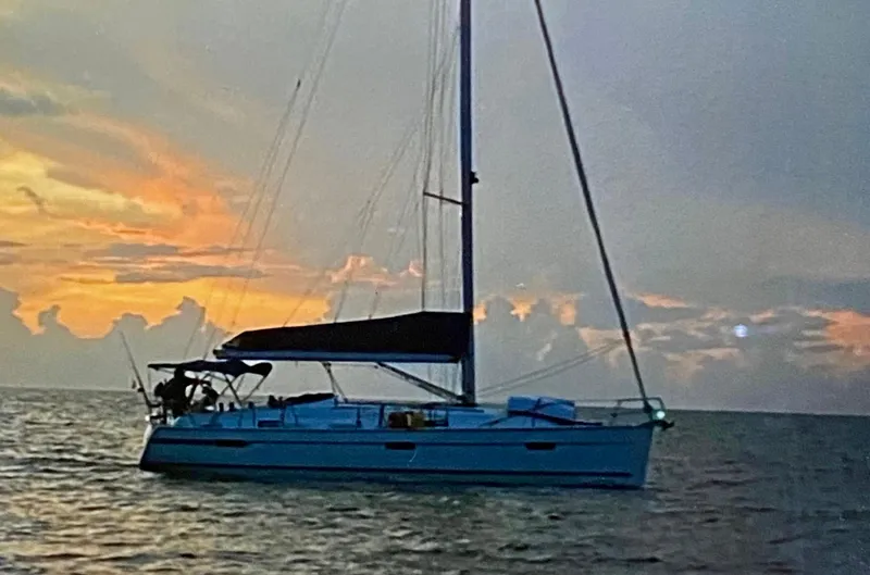 Slide: The Image of Sailing yacht Bavaria 36 Cruiser 2011 at sunset on calm sea. - 3