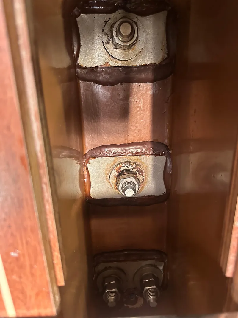 Slide: The Image of Close-up of Bavaria 36 Cruiser 2011 keel bolts and metal plates. - 34