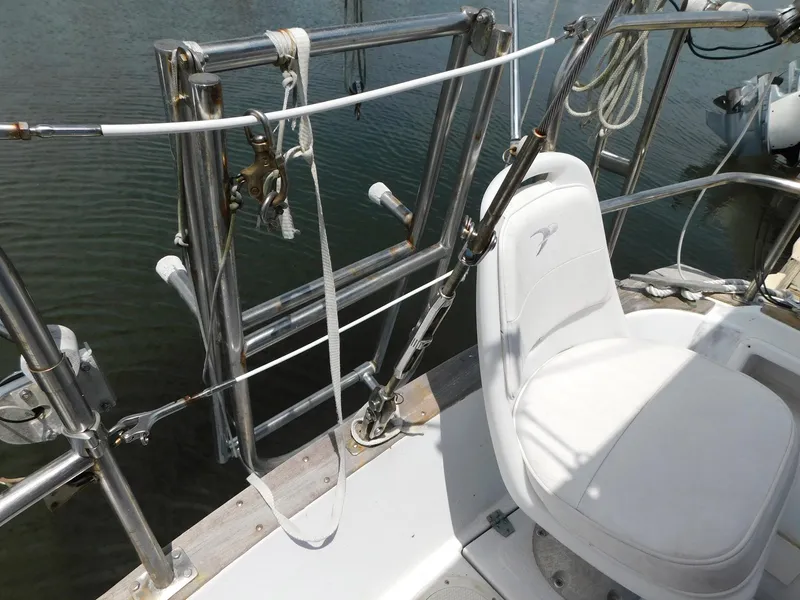 Slide: The Image of 1984 Endeavour 35.5 Sloop cockpit with white seat and stainless steel rigging. - 37