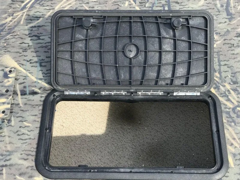 Slide: The Image of Open storage compartment on War Eagle Blackhawk 2170 boat, 2025 model. - 4