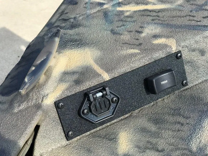 Slide: The Image of 2025 War Eagle Blackhawk 2170 boat with camo finish and trim control. - 5