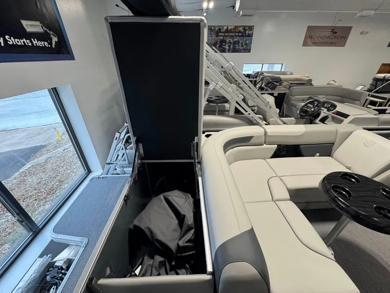 Slide: The Image of Interior of 2025 Godfrey Sweetwater 2086 C pontoon boat with seating and storage. - 11