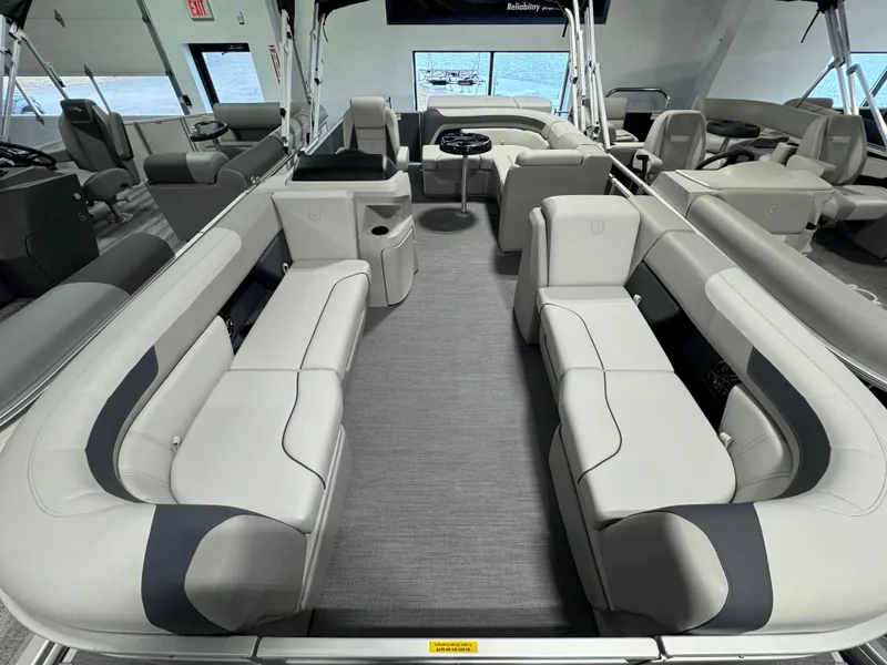 Slide: The Image of 2025 Godfrey Sweetwater 2086 C pontoon boat interior with spacious seating and modern design. - 3