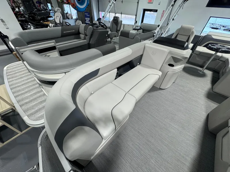 Slide: The Image of 2025 Godfrey Sweetwater 2086 C pontoon boat interior with modern seating and sleek design. - 4