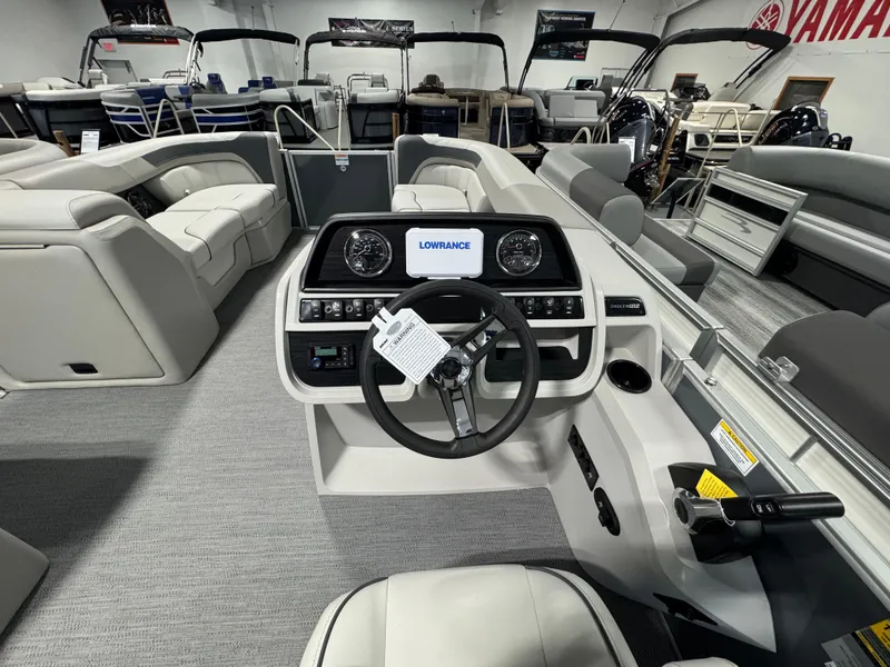Slide: The Image of 2025 Godfrey Sweetwater 2086 C pontoon boat interior with steering console and seating. - 8