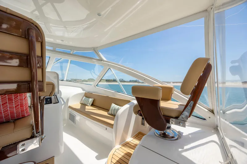 Slide: The Image of Luxurious interior of 2013 Viking 42 yacht with plush seating and ocean view. - 28