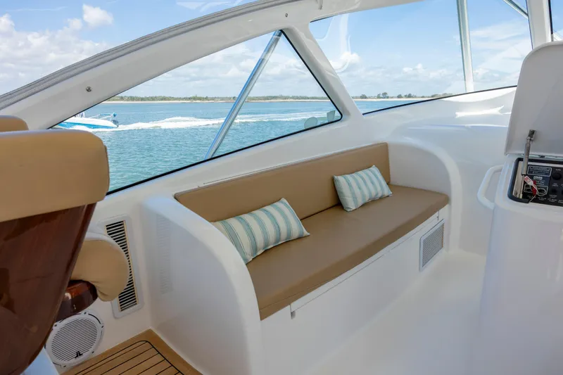 Slide: The Image of Luxurious interior of 2013 Viking 42 yacht with comfortable seating and scenic ocean view. - 32