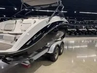 Slide: The Image of 2016 Scarab 255 H.O. Platinum boat on trailer in showroom. - 3