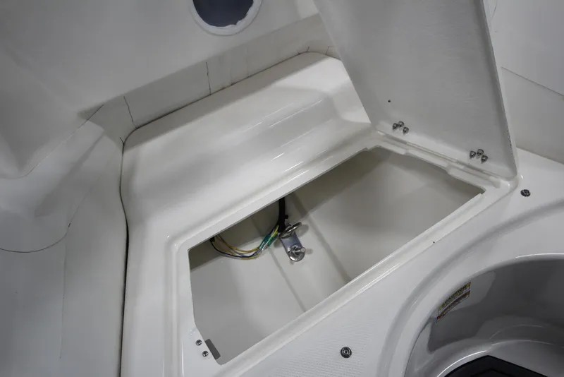 Slide: The Image of Open storage compartment on 2025 Zodiac Yachtline 490 Deluxe NEO 90hp boat. - 22
