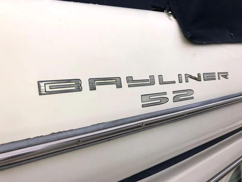 Slide: The Image of 2002 Bayliner 5288 PILOTHOUSE boat exterior with logo and model number. - 2