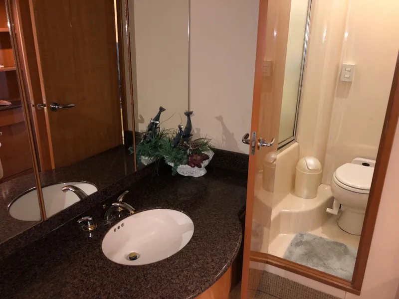 Slide: The Image of Luxurious bathroom in 2002 Bayliner 5288 PILOTHOUSE yacht with modern fixtures and decor. - 34