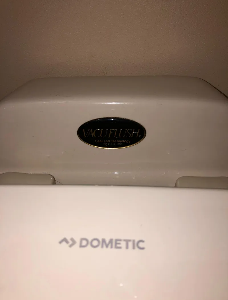 Slide: The Image of Vacuflush toilet system in 2002 Bayliner 5288 Pilothouse yacht bathroom. - 46