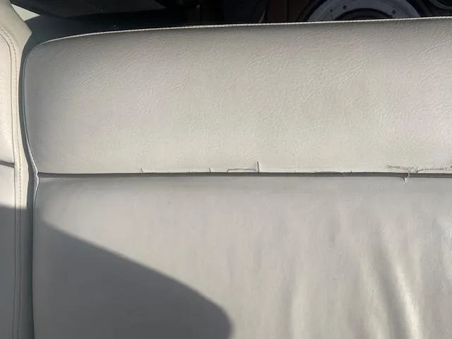 Slide: The Image of Close-up of 2007 Crownline 230 LS boat seat with slight wear. - 11