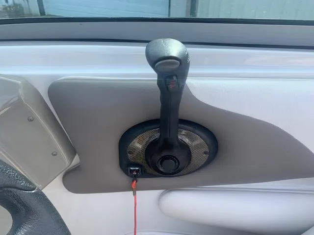 Slide: The Image of Throttle control lever on a 2007 Crownline 230 LS boat. - 18