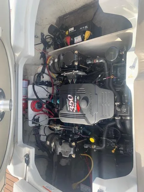 Slide: The Image of 2007 Crownline 230 LS boat engine compartment with MerCruiser 350 MAG engine. - 26