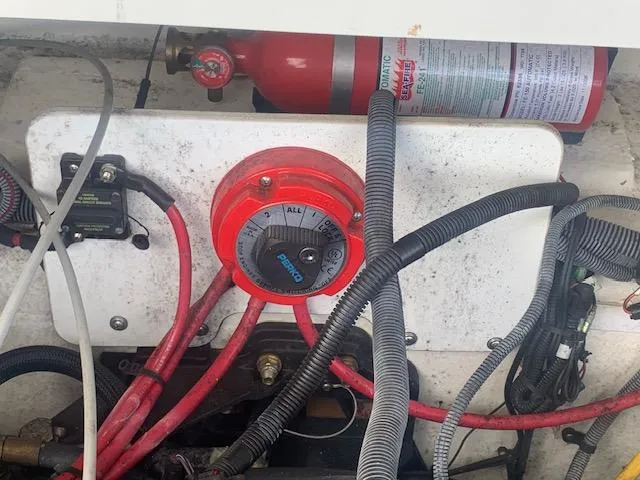 Slide: The Image of 2007 Crownline 230 LS boat engine compartment with wiring and fire extinguisher. - 29