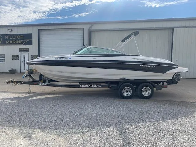 Slide: The Image of 2007 Crownline 230 LS boat on trailer outside Hilltop Marine. - 38