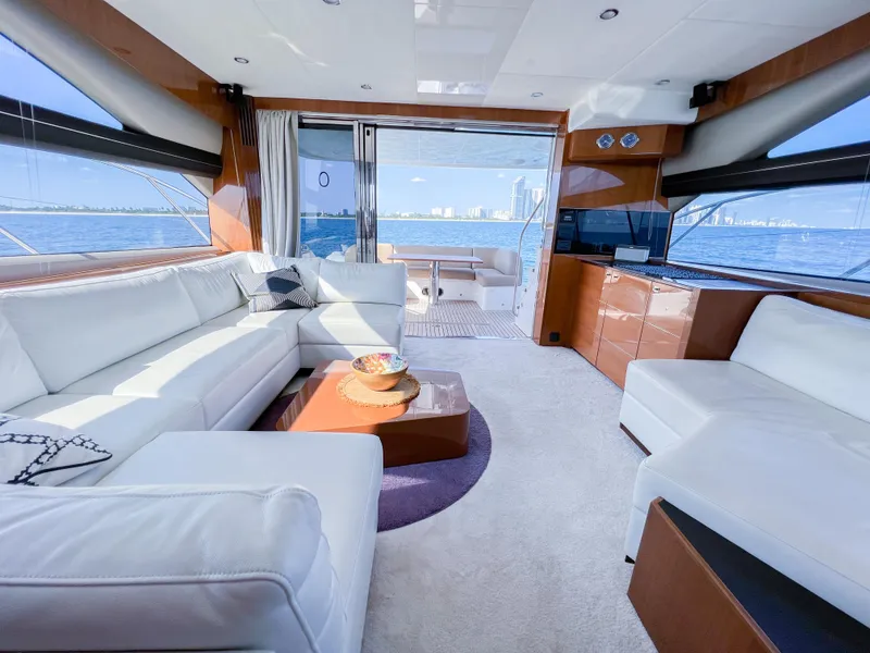Slide: The Image of Luxurious interior of 2013 Princess 60 yacht with white seating and ocean view. - 10