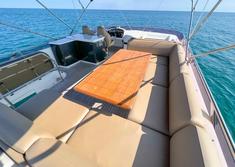 Slide: The Image of Luxurious 2013 Princess 60 yacht deck with spacious seating and ocean view. - 16