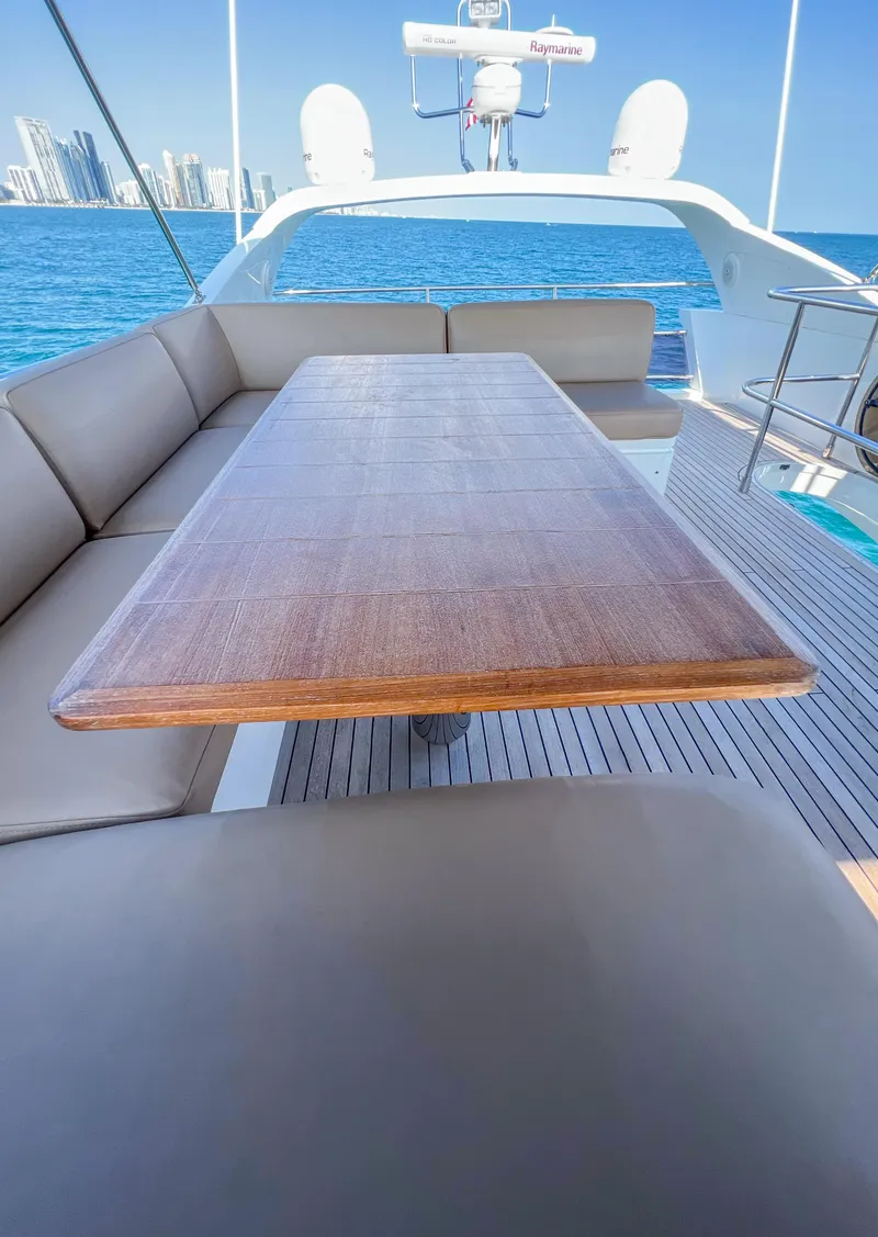 Slide: The Image of Luxurious 2013 Princess 60 yacht deck with elegant seating and ocean view. - 17