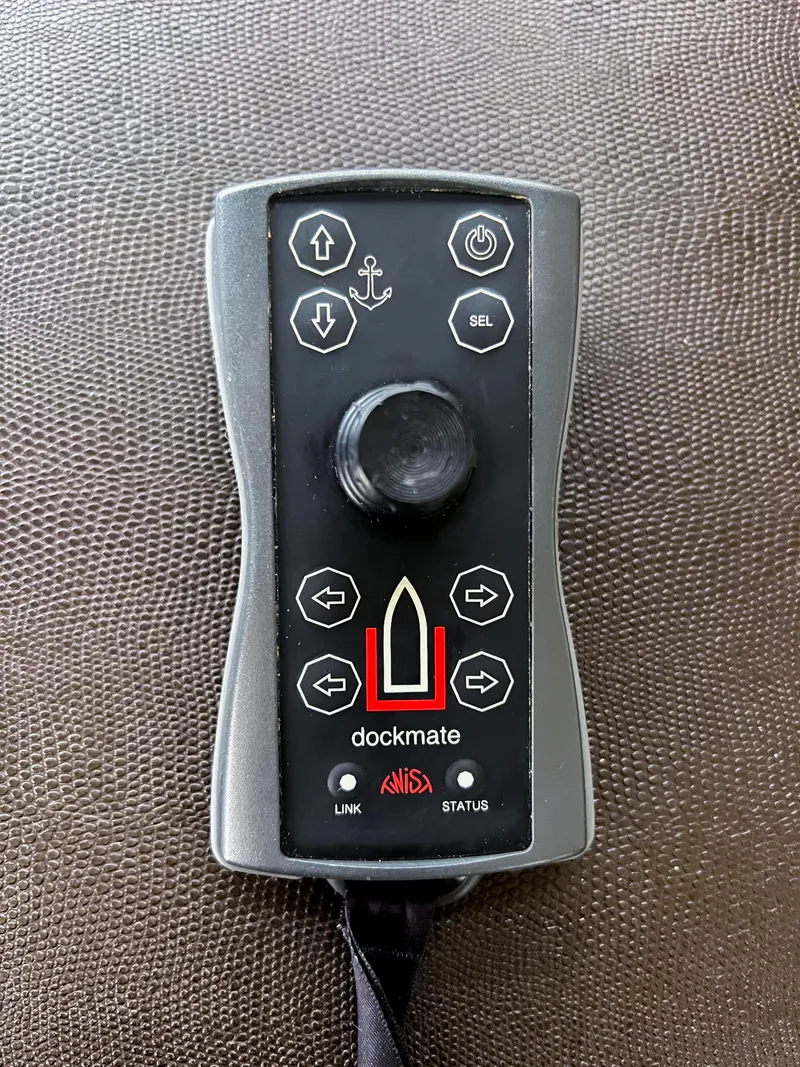 Slide: The Image of Dockmate remote control for Princess 60 yacht, 2013 model, on textured surface. - 23