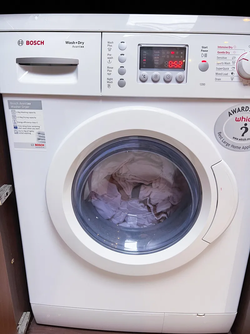 Slide: The Image of Bosch front-loading washing machine with digital display, model Princess 60, year 2013. - 24