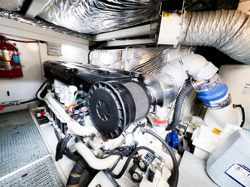 Slide: The Image of Engine room of 2013 Princess 60 yacht with visible machinery and ventilation. - 26