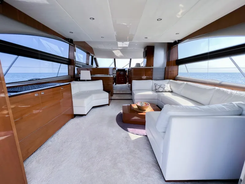 Slide: The Image of Luxurious interior of 2013 Princess 60 yacht with white sofas and panoramic windows. - 27