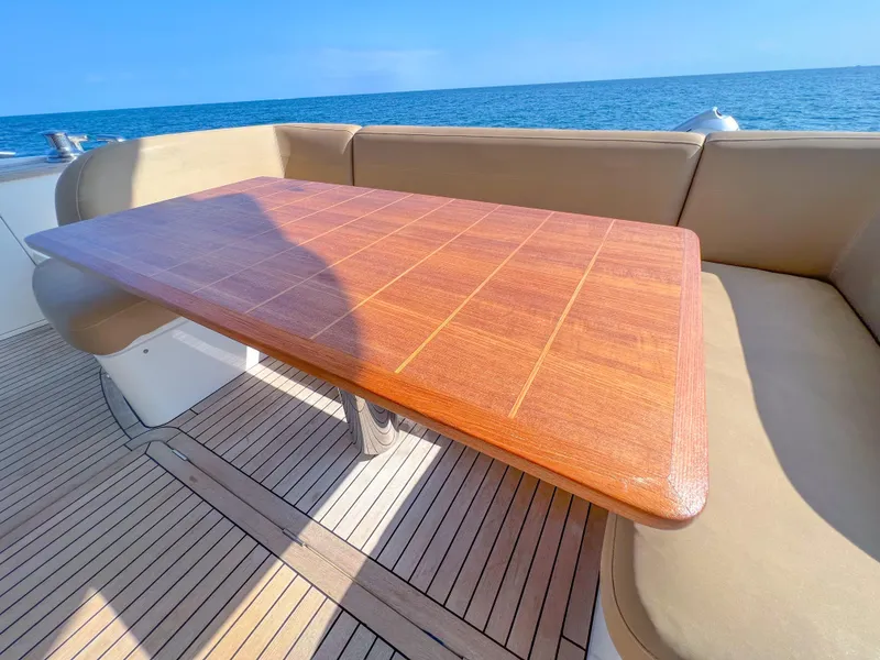 Slide: The Image of Luxurious Princess 60 yacht deck with wooden table, 2013 model, ocean view. - 9